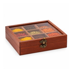Mahogany-tone rectangular wooden spice organizer box with a clear lid, divided inner compartments and small brass-tone clasp
