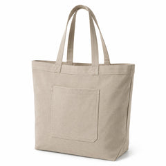 Greige canvas tote bag with a large front utility pocket and long handles on a white background.