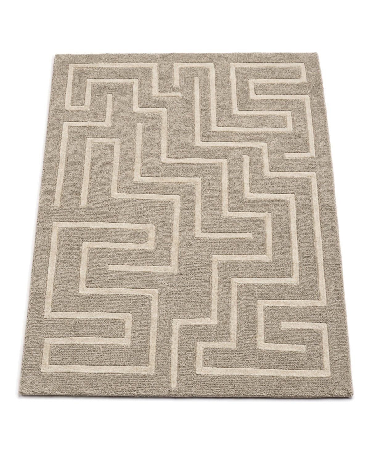 Greige and cream hand-tufted area rug with angular maze pattern on a white background.