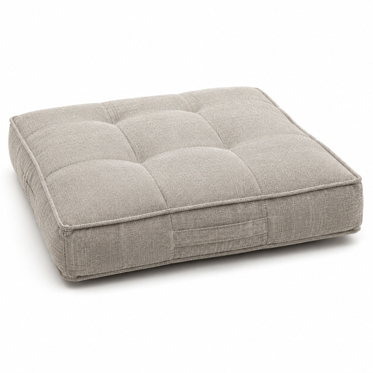 Greige square floor cushion with grid tufting and textured fabric on white background