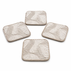 Greige ivory abstract textured coaster set on a clean white background