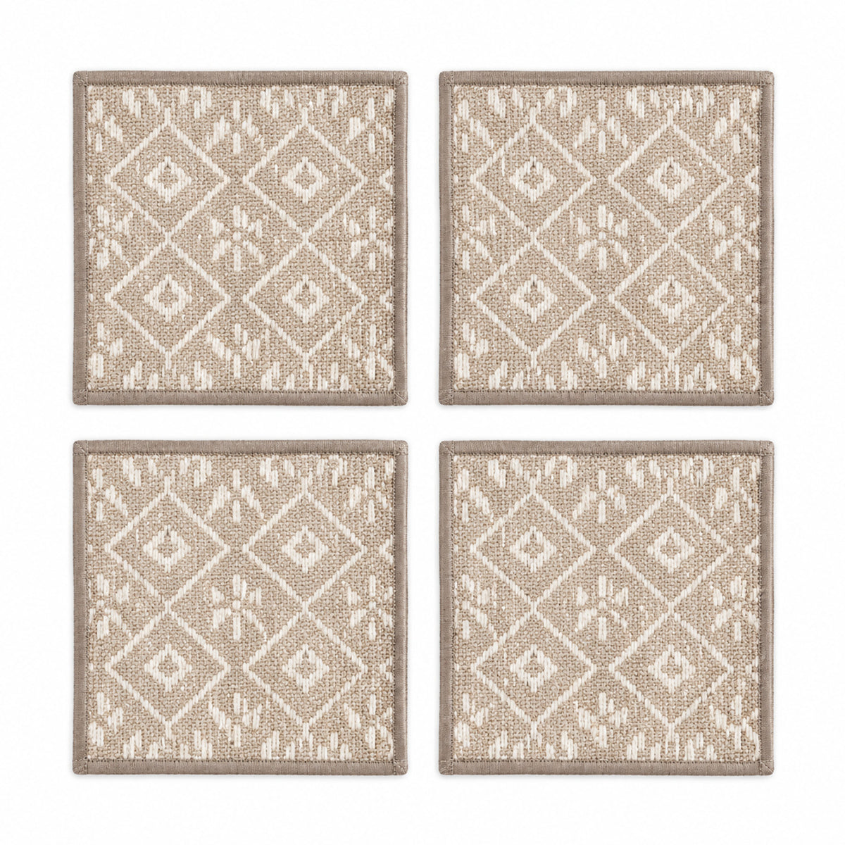 Greige ivory geometric coaster set on a clean white background