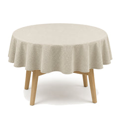 Primeval greige ivory geometric woven tablecloth displayed on a round dining table
