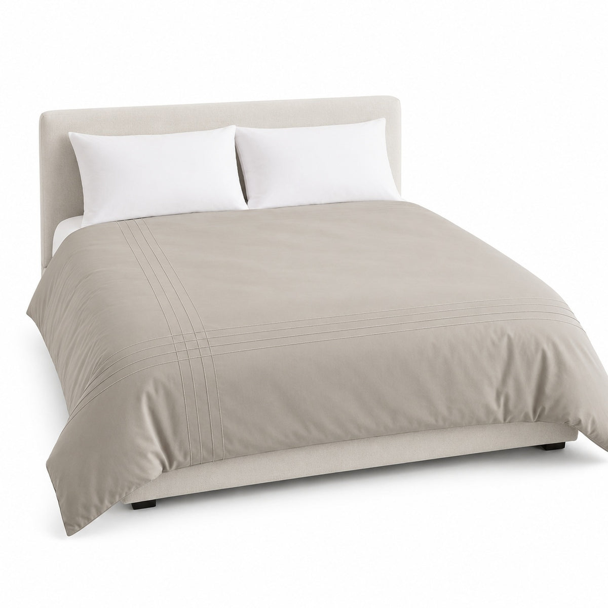 Primeval greige stitched linear detail duvet cover displayed on a styled bed against a clean white studio background