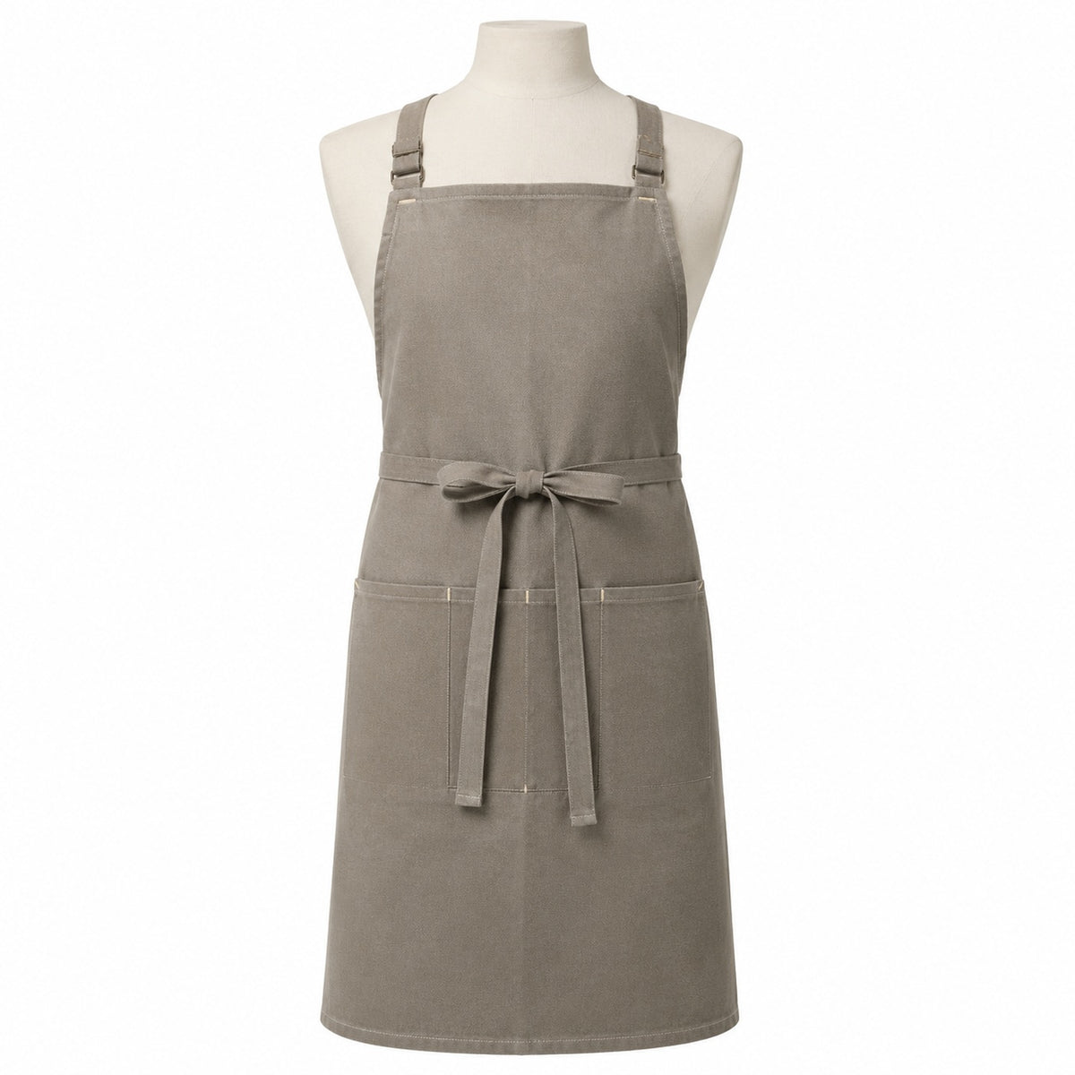 Primeval greige utility chef apron with front pockets displayed on a dress form
