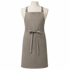 Primeval greige utility chef apron with front pockets displayed on a dress form