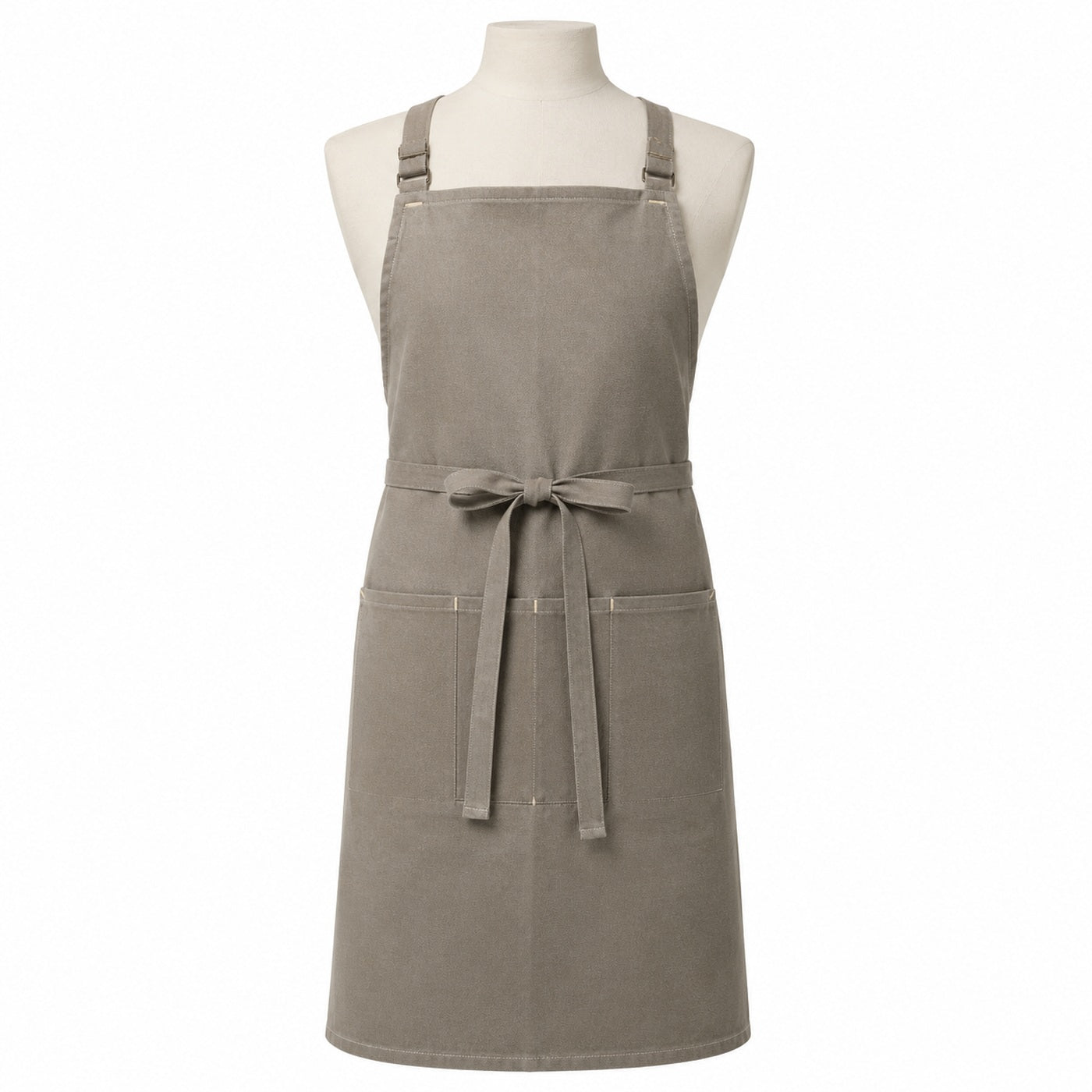 Primeval greige utility chef apron with front pockets displayed on a dress form