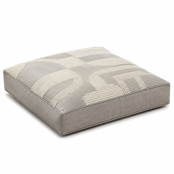 Grey and ivory geometric block-pattern square floor cushion on white background
