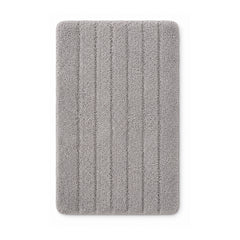 Grey ribbed plush bath mat on white background