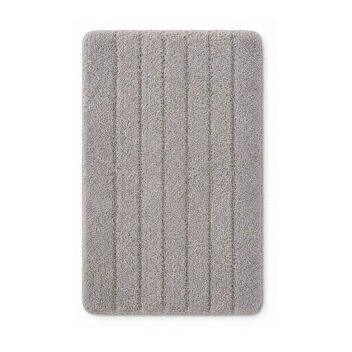 Grey ribbed plush bath mat on white background