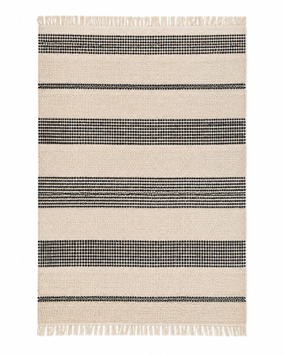 Black and ivory handwoven cotton rug with bold horizontal stripes and fringe