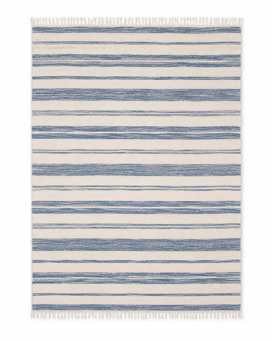 Blue and ivory handwoven cotton rug with hand-drawn style horizontal stripes and fringe