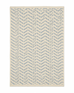 Blue and ivory handwoven cotton rug with small herringbone chevron repeat