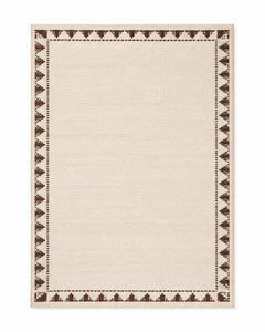 Ivory handwoven cotton rug with brown triangular geometric border