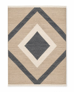 Charcoal taupe and cream handwoven cotton rug with nested diamond geometry