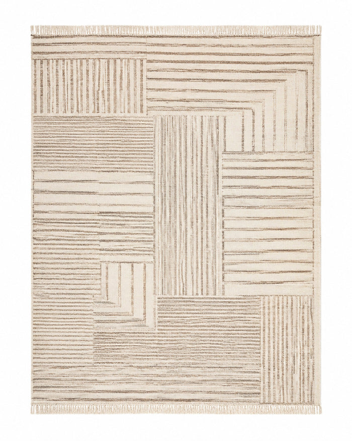 Ivory and beige handwoven cotton rug with linear patchwork geometric pattern
