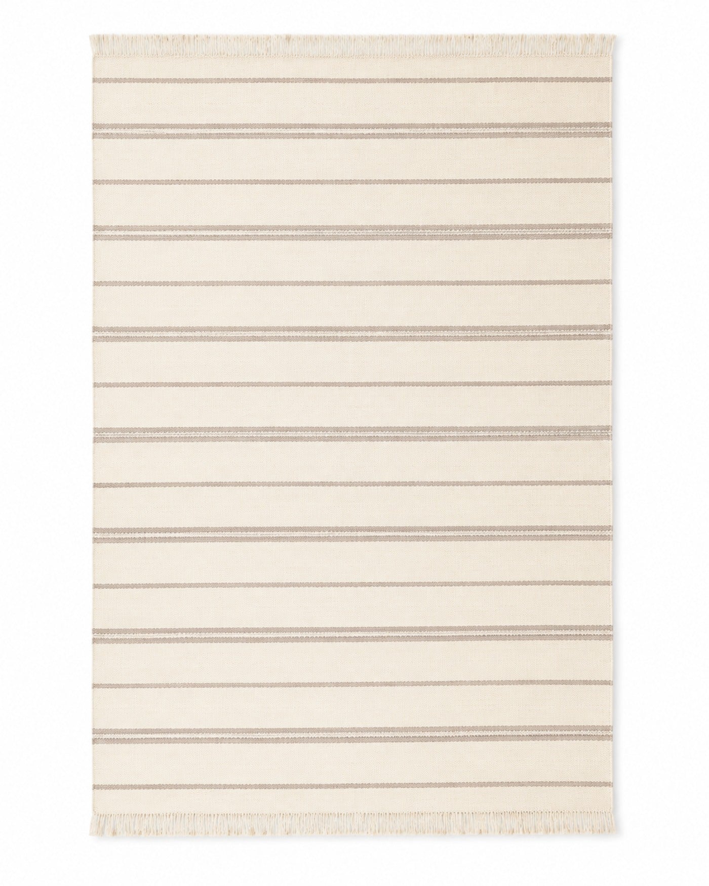Ivory and taupe handwoven cotton rug with fine horizontal stripes and fringe