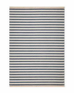 Navy and ivory handwoven cotton rug with narrow horizontal pinstripes