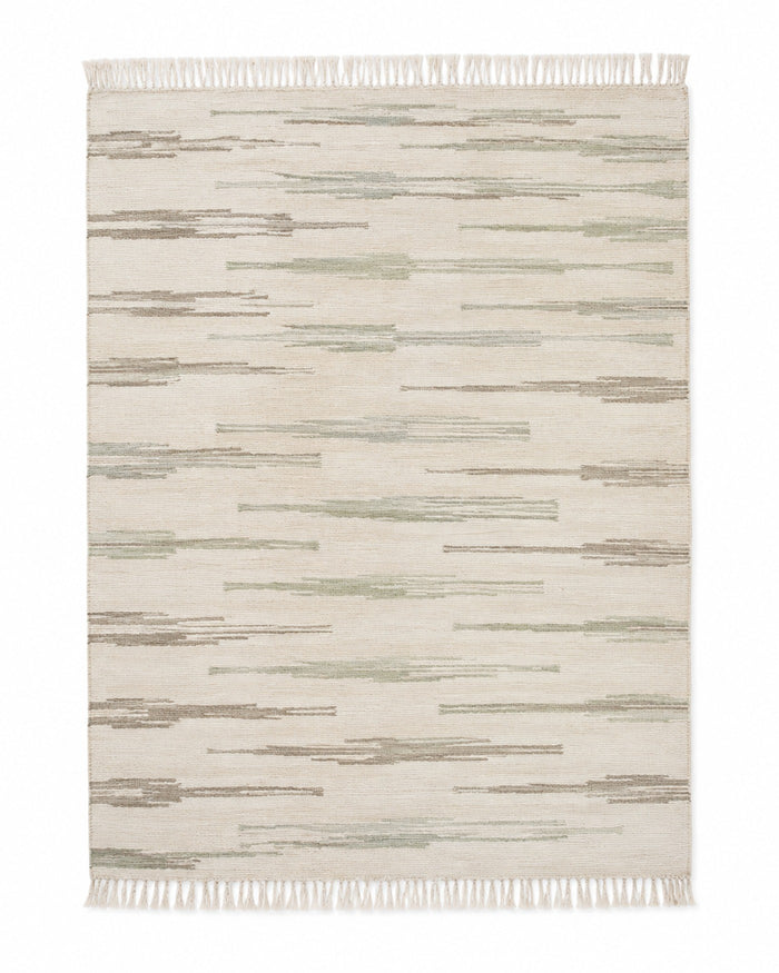 Sage and beige handwoven cotton rug with abstract broken stripe texture and fringe
