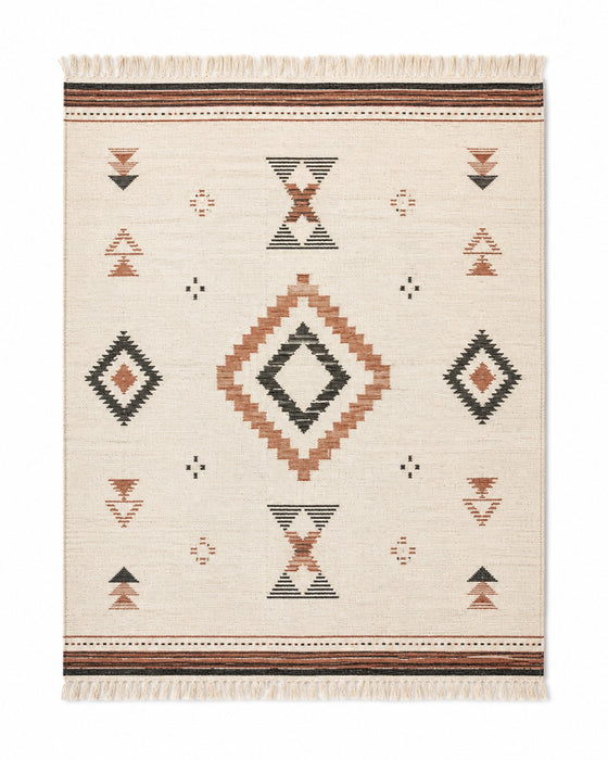 Terracotta charcoal and ivory handwoven cotton rug with centered tribal geometric motifs