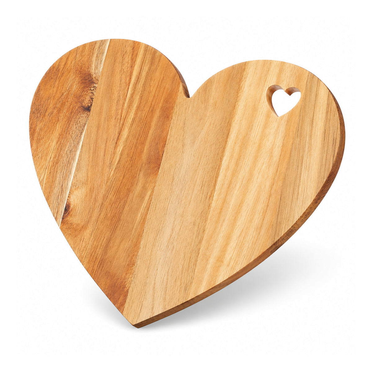 Heart-shaped light honey-brown wooden cutting and serving board with a small heart-shaped opening near its upper edge