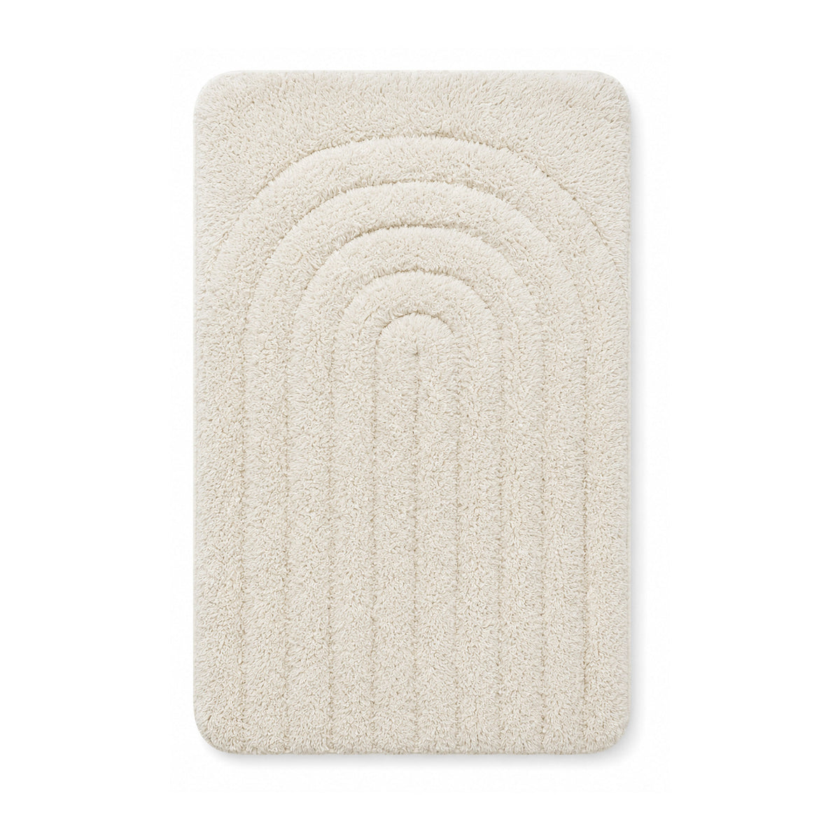 Ivory arch tufted bath mat on white background