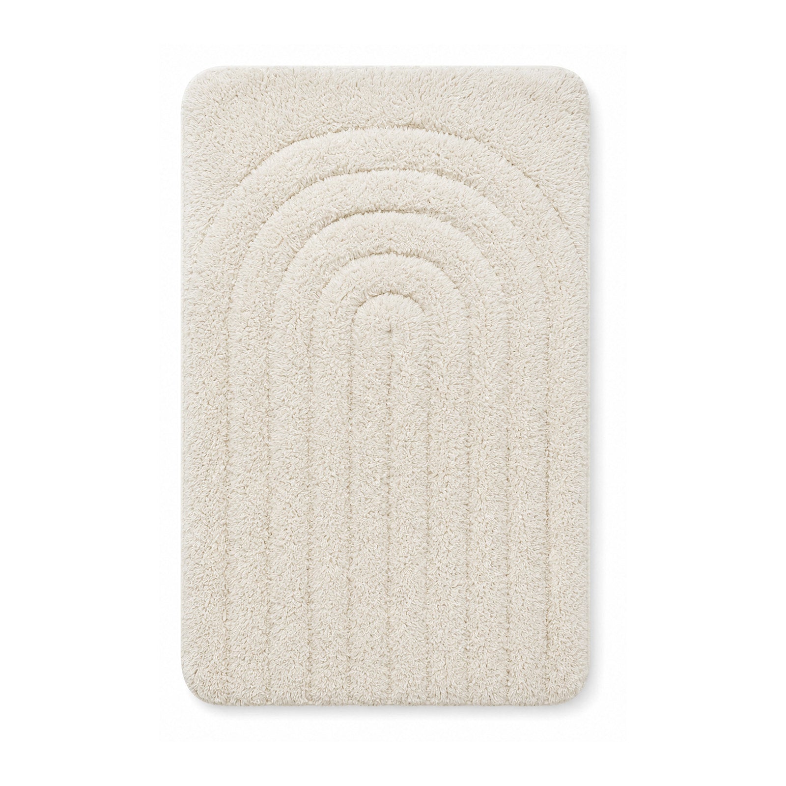 Ivory arch tufted bath mat on white background