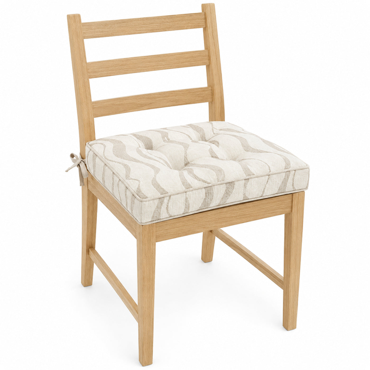 Primeval ivory and beige wavy line dining chair pad with tie straps on wooden dining chair