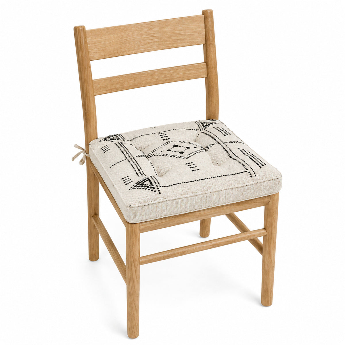 Primeval ivory and black abstract line dining chair pad with tie straps on wooden dining chair