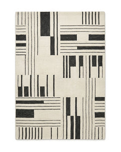 Ivory and black abstract linear geometric area rug by Primeval