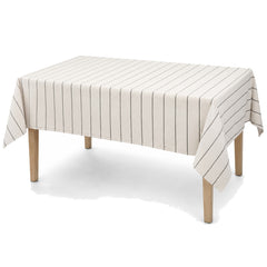 Primeval ivory black fine stripe tablecloth displayed on a rectangular dining table