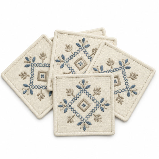 Ivory blue taupe embroidered coaster set on a clean white background