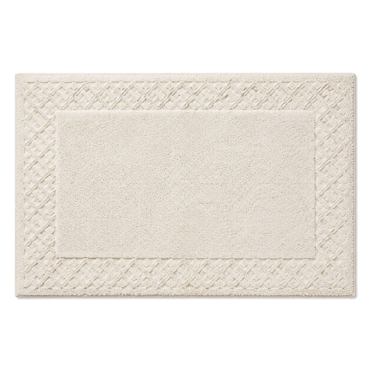 Ivory braided border bath mat for classic neutral bathroom decor - Primeval