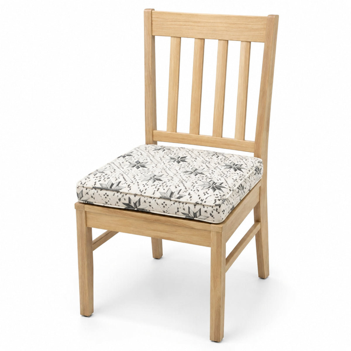 Primeval ivory and charcoal floral line dining chair pad with tie straps on wooden dining chair