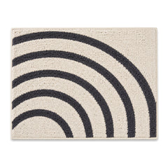 Ivory and charcoal rainbow arc bath mat for modern bathroom decor - Primeval