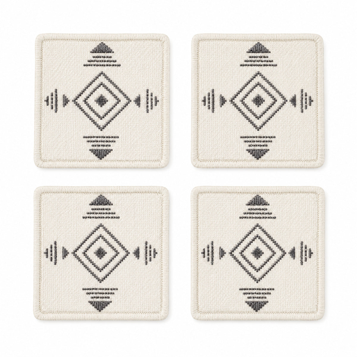 Ivory charcoal Scandinavian geometric coaster set on a clean white background