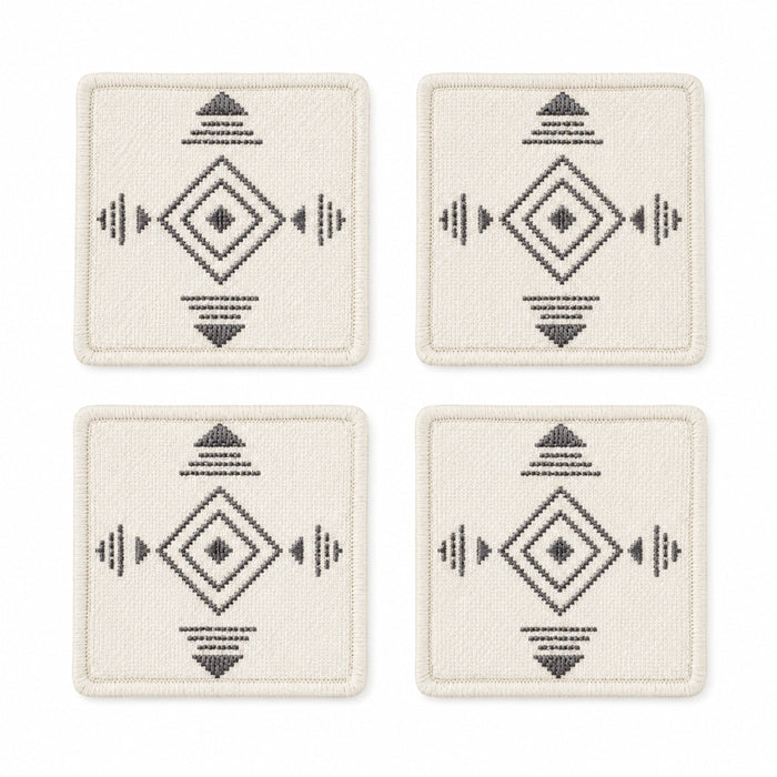 Ivory charcoal Scandinavian geometric coaster set on a clean white background