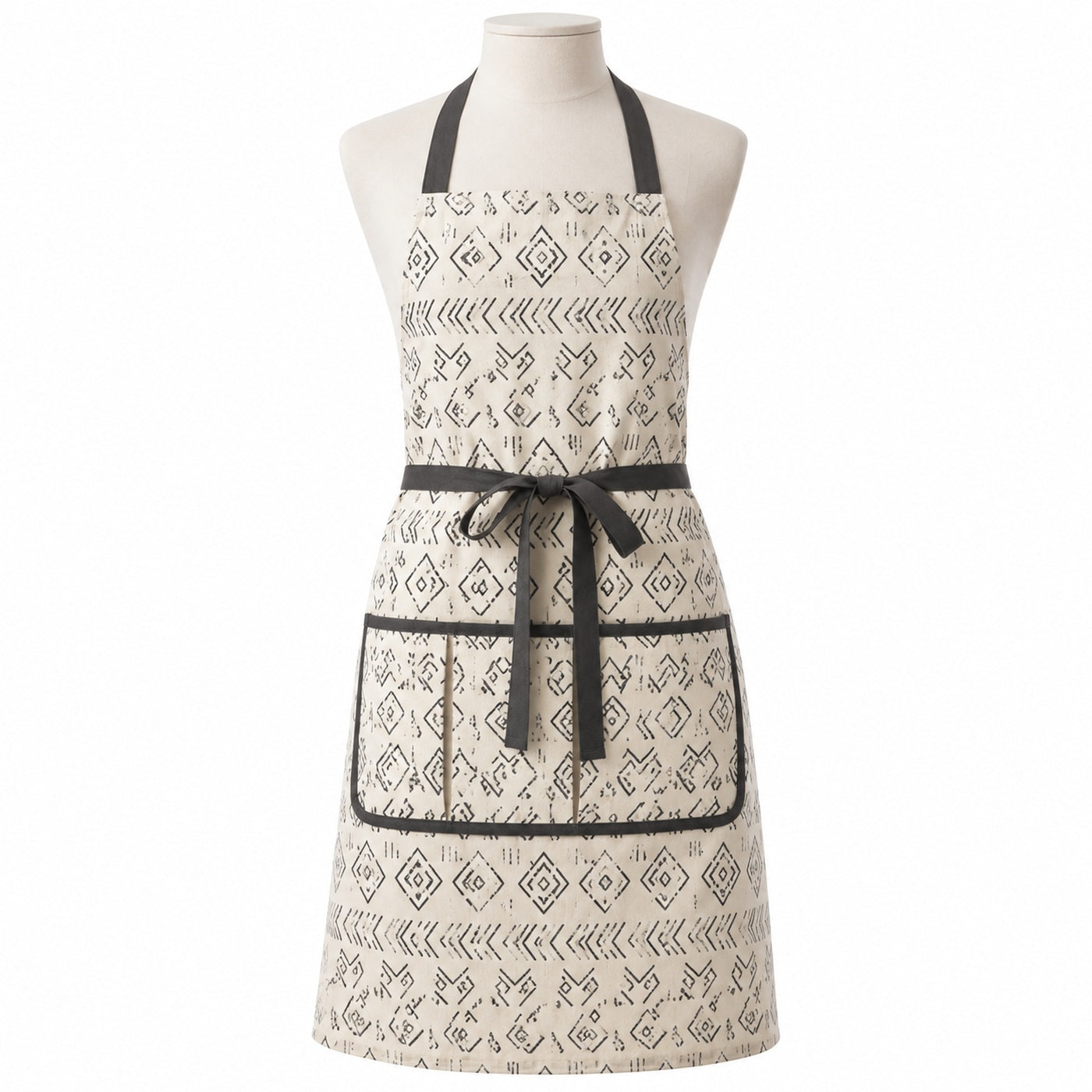 Primeval ivory chef apron with charcoal Scandinavian-style print displayed on a dress form