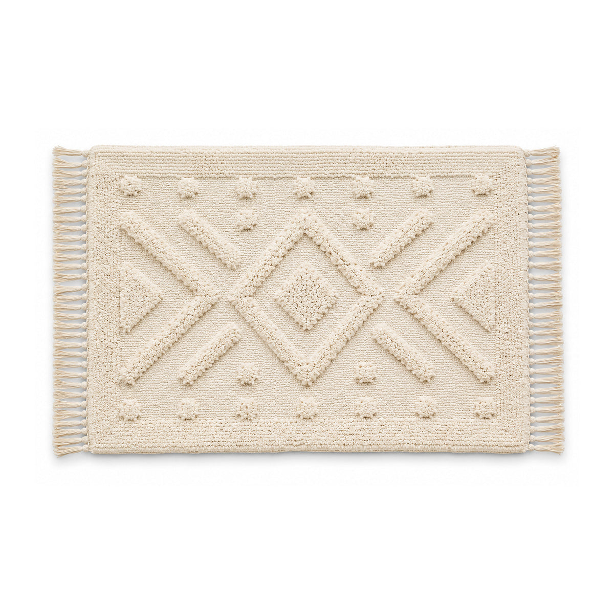 Ivory chevron textured bath mat with fringe on white background