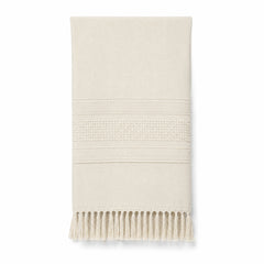 Ivory fringed Turkish cotton hammam towel 90x180 cm on white background
