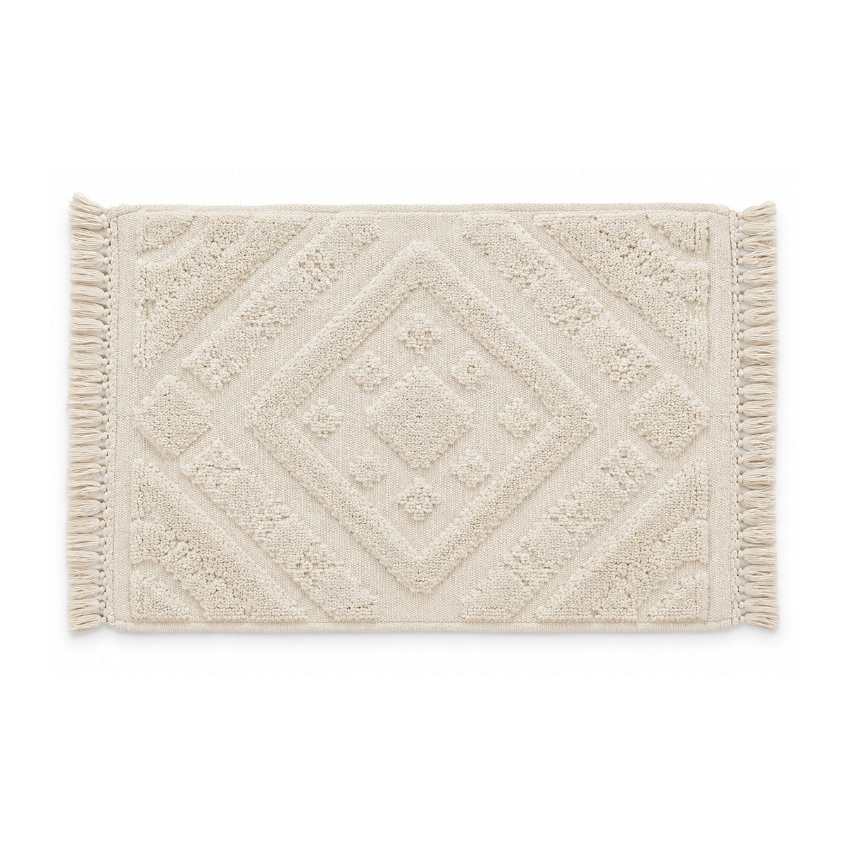 Ivory geometric tufted bath mat with textured pattern on white background