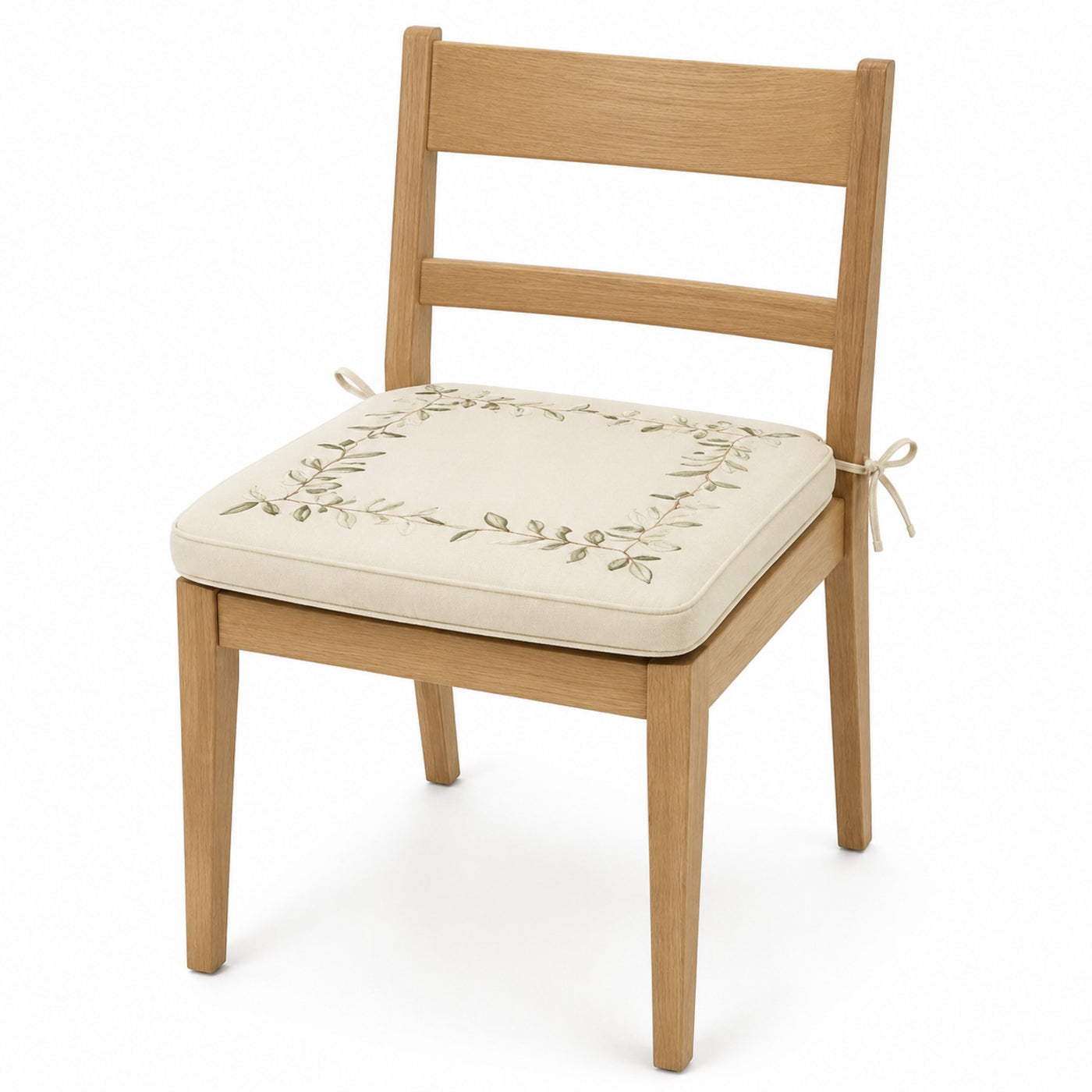 Primeval ivory and olive botanical border dining chair pad with tie straps on wooden dining chair
