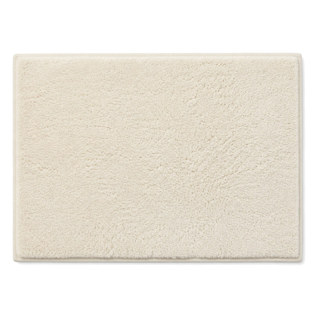 Ivory plush plain bath mat for soft neutral bathroom decor - Primeval