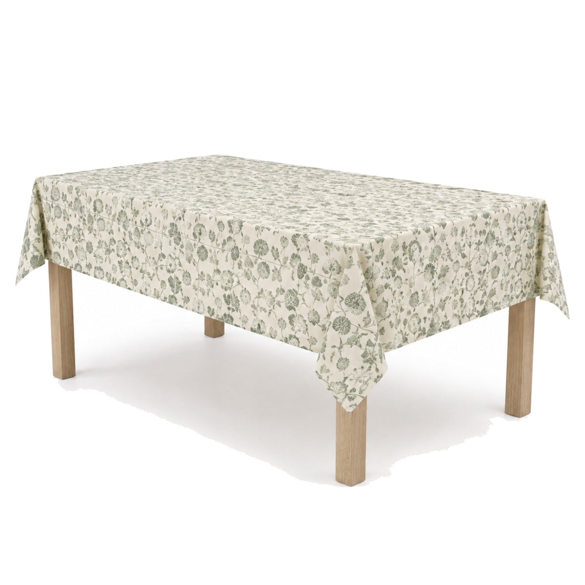 Primeval ivory sage botanical block print tablecloth displayed on a rectangular dining table