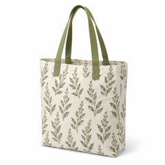 Ivory tote bag with sage botanical leaf print and olive handles on a white background.