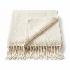 Ivory solid textured woven cotton throw with fringe 130×170 cm by Primeval