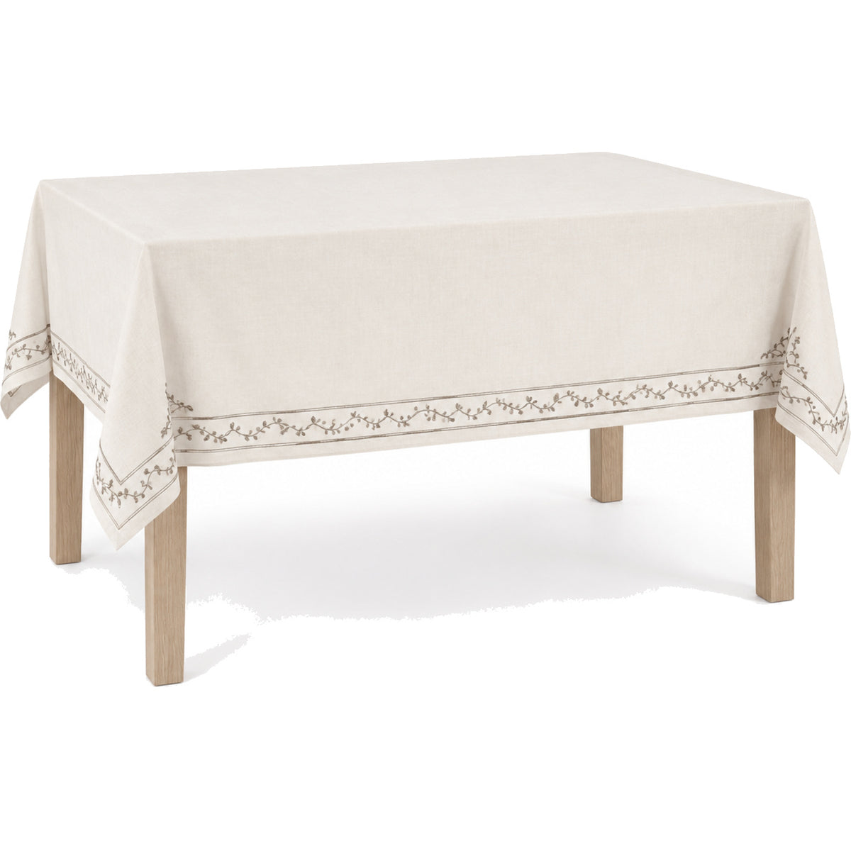 Primeval ivory taupe elegant embroidered border tablecloth displayed on a rectangular dining table
