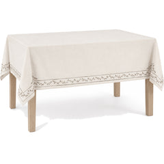 Primeval ivory taupe elegant embroidered border tablecloth displayed on a rectangular dining table