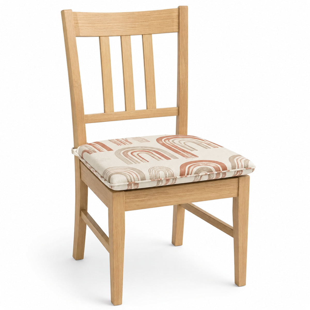 Primeval ivory and terracotta arc geometric dining chair pad with tie straps on wooden dining chair