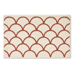 Ivory and terracotta scallop bath mat for warm modern bathroom decor - Primeval